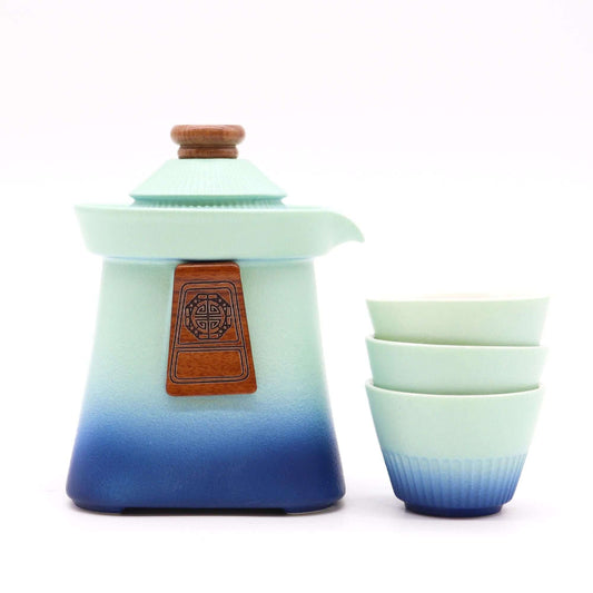 Temple Teapot Set & Three Cups - Blue Heaven - Ceramic tea service with intricate design in blue and green.