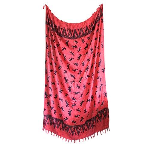 Bali Gecko Sarongs - Pink showcases a vibrant coral-pink base adorned with playful geckos and elegant fringe trim.