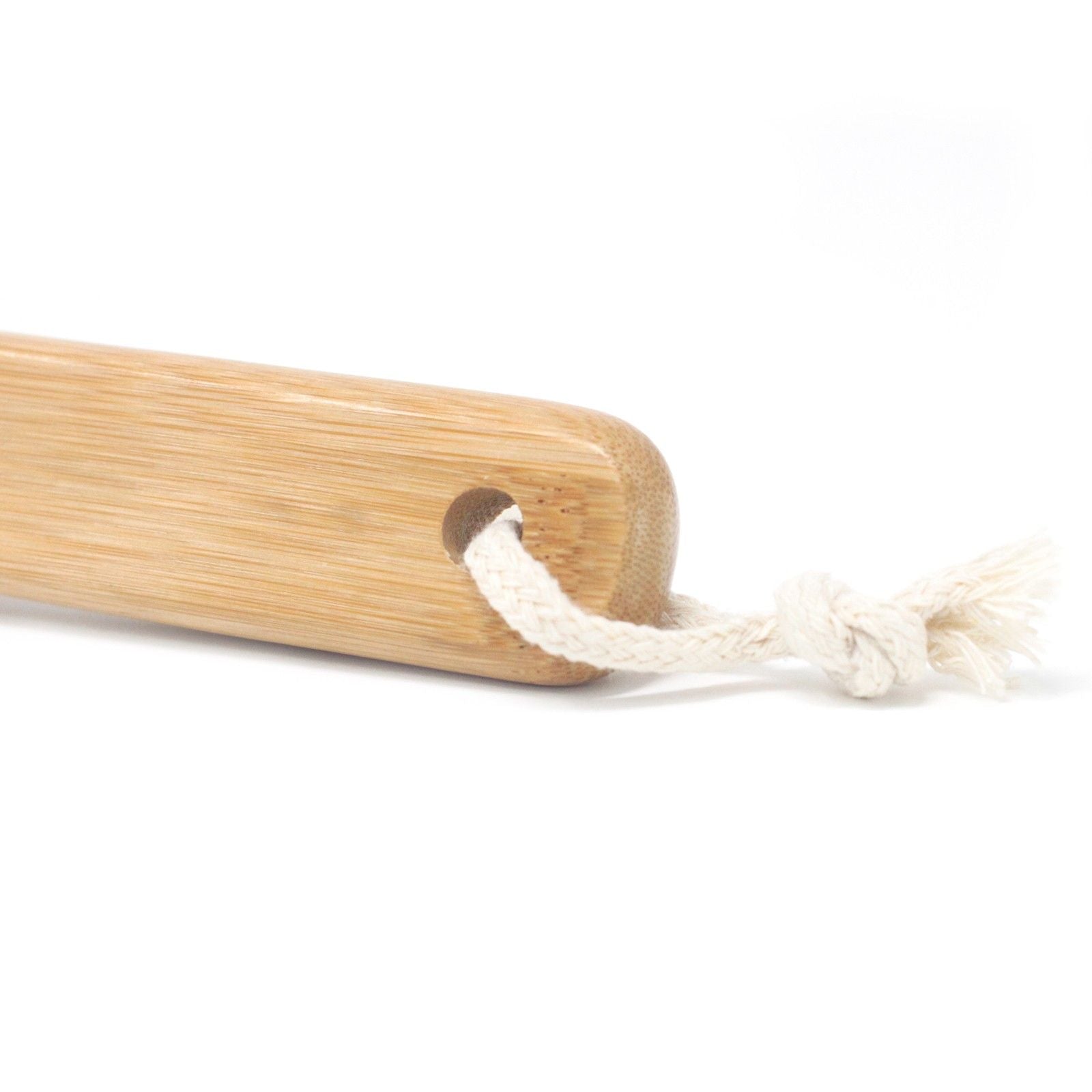 Bamboo beard brush handle with a white hanging cord threaded through a hole.