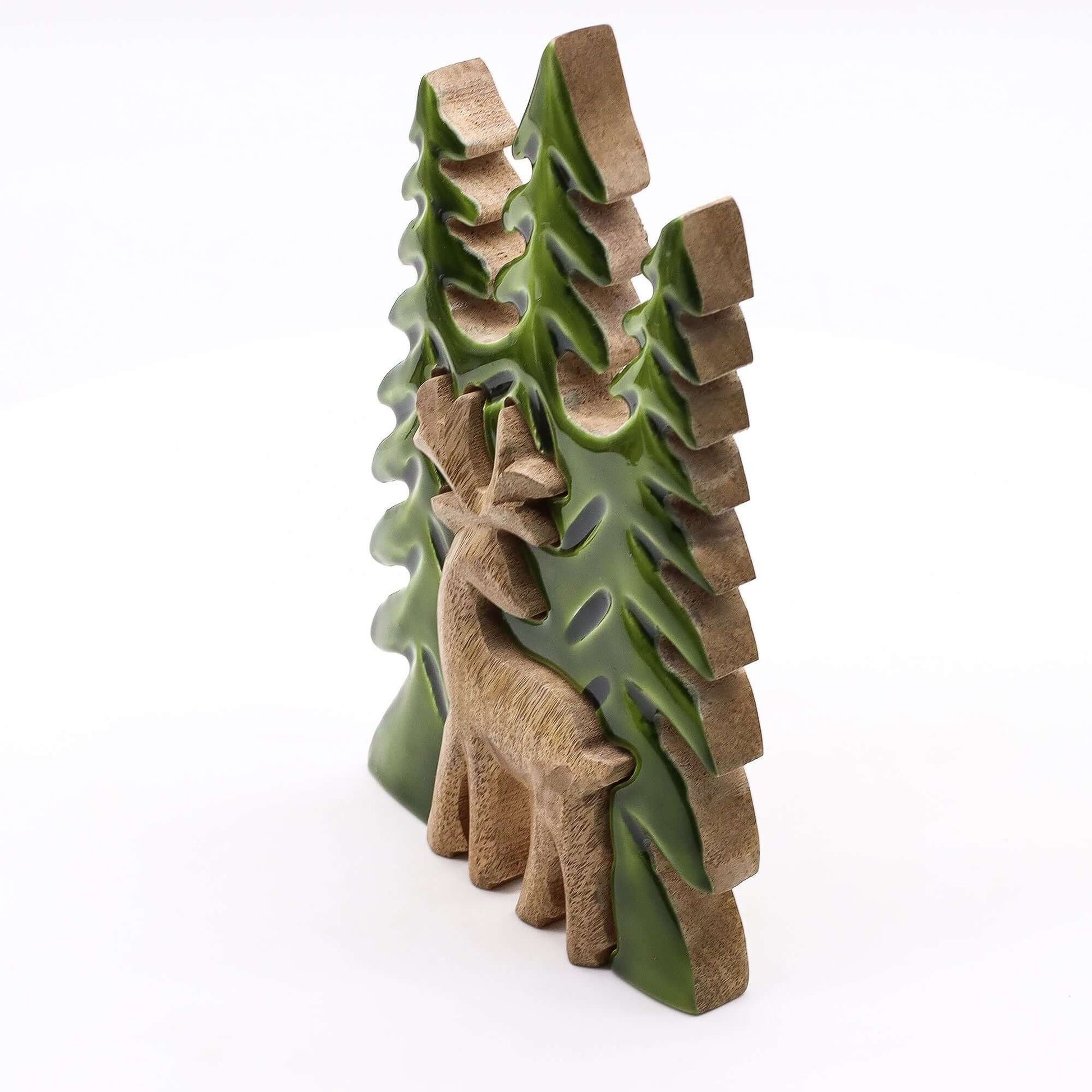 Lost in the Forrest 3D wooden decoration featuring a stag among stacked green trees, 23x20cm, handcrafted in India.