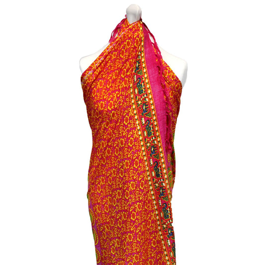 Vibrant Ruby Lime Mandala Sarongs featuring intricate peacock feather designs in rich magenta and lime tones.