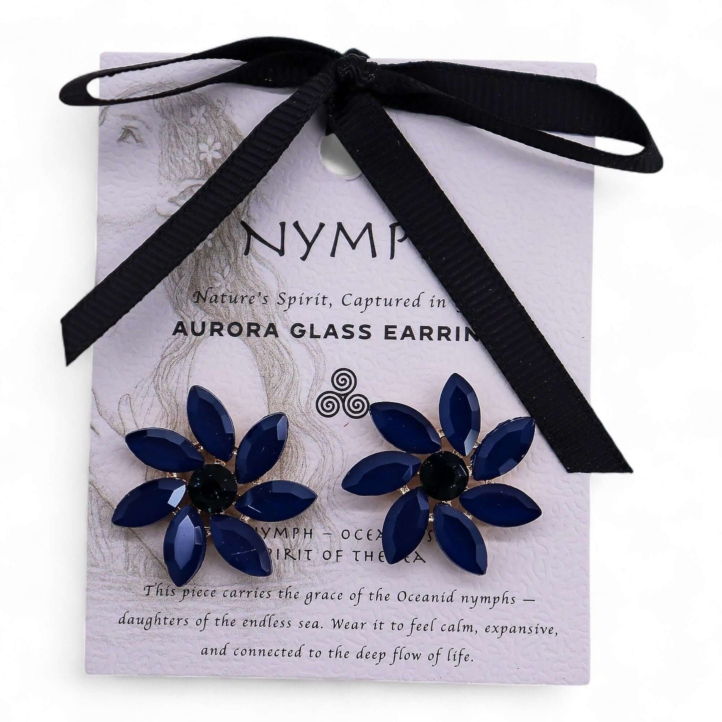 Royal blue vintage glass flower earrings with stainless steel findings on a lilac card.