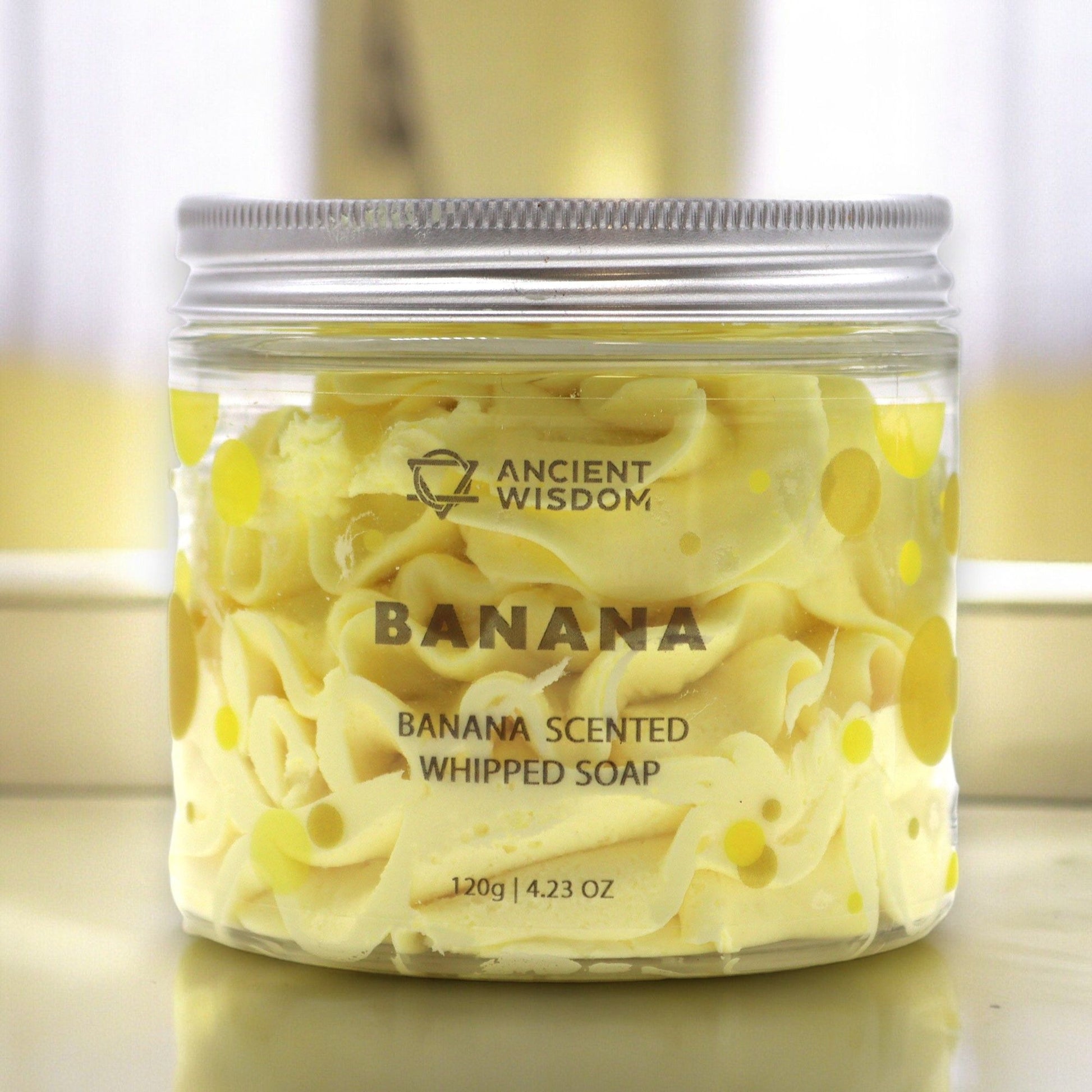 Banana Whipped Soap 120g in a clear jar with yellow dots, Ancient Wisdom label.