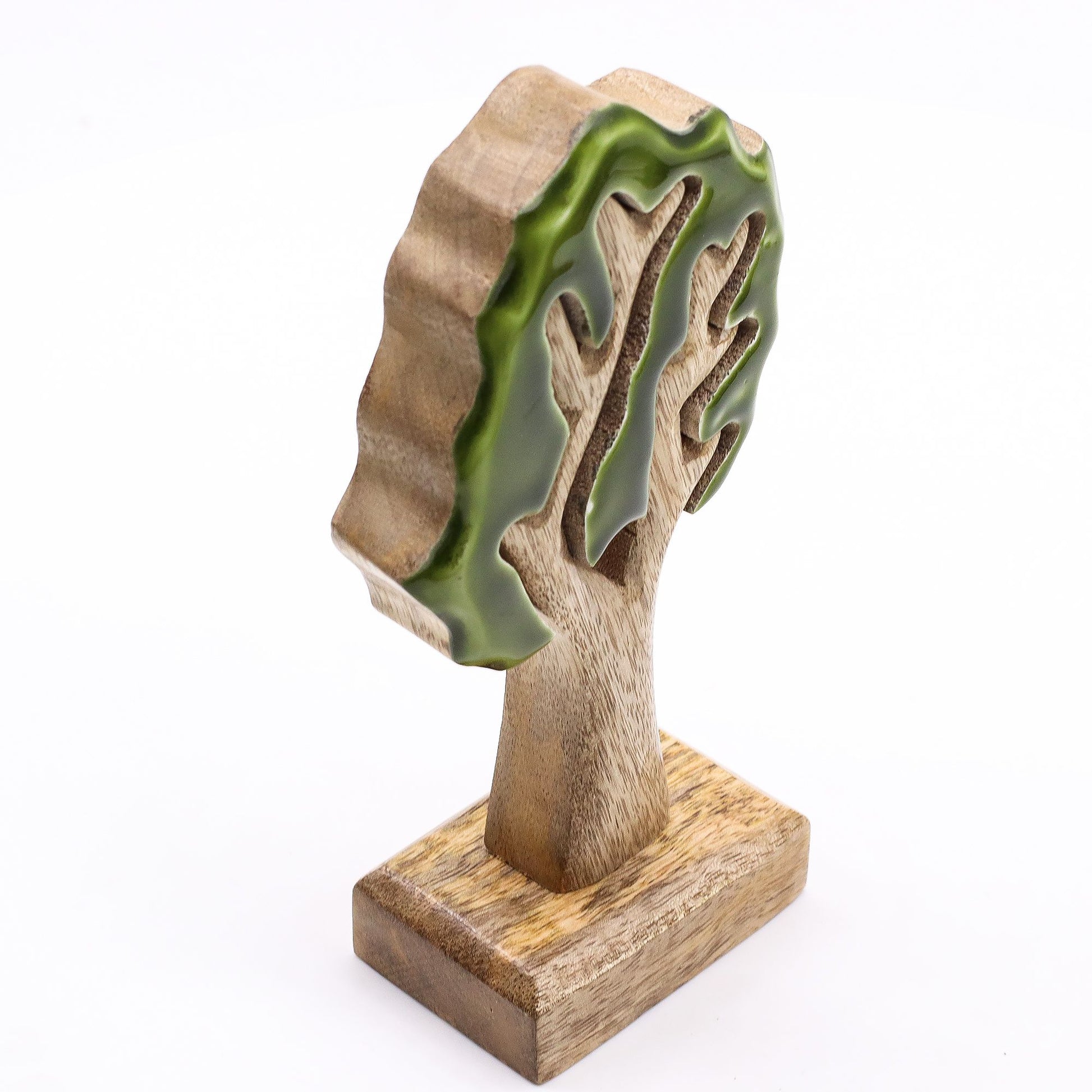 3D mango wood tree ornament with glossy green enamel on a wooden base.