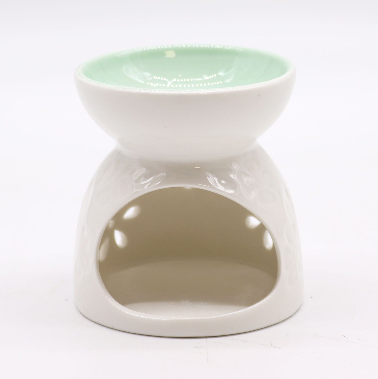 Classic White Oil Burner - Floral with Teal Well ceramic oil burner, white body with floral cutouts and teal bowl