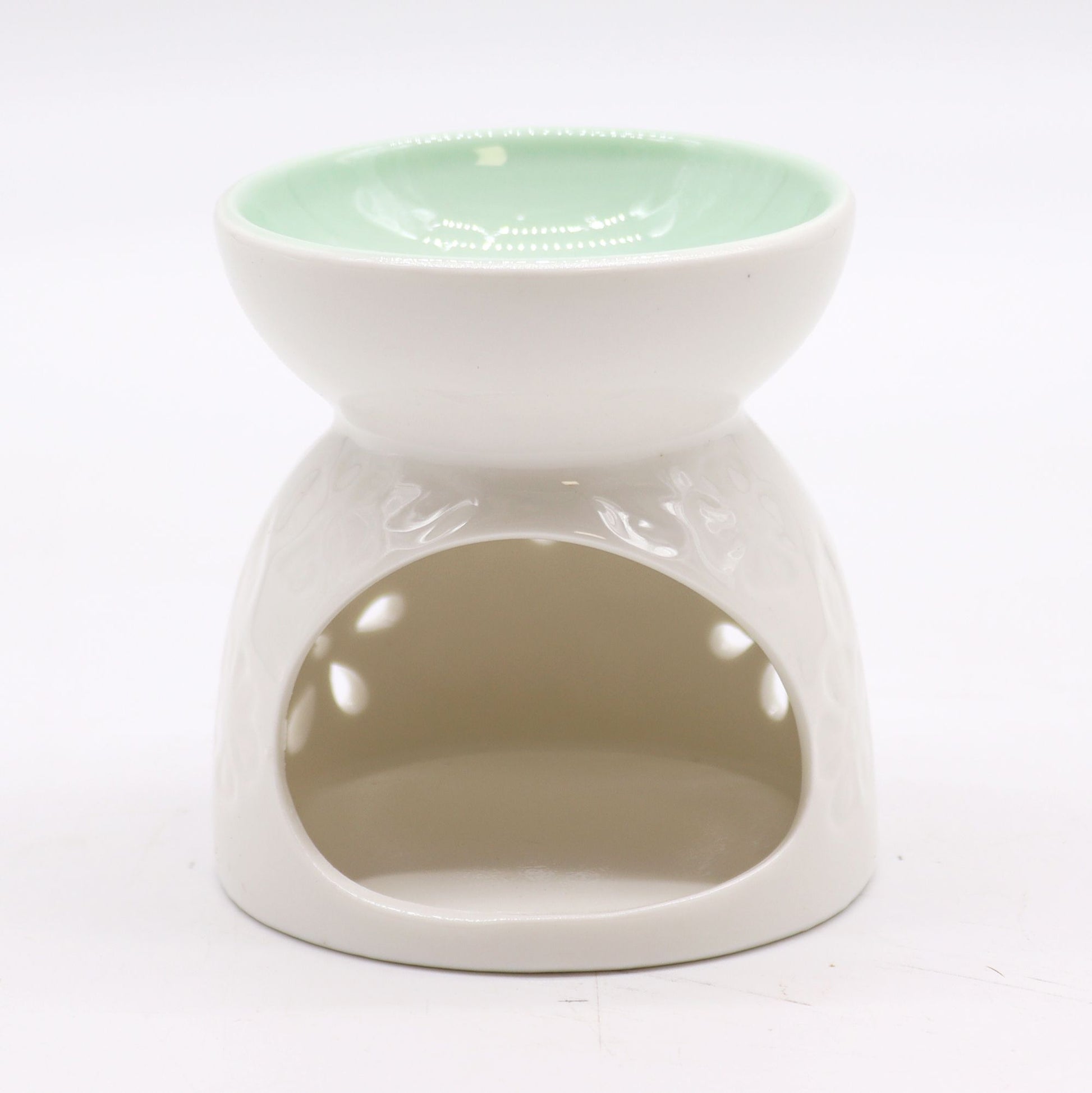 Classic White Oil Burner - Floral with Teal Well ceramic oil burner, white body with floral cutouts and teal bowl