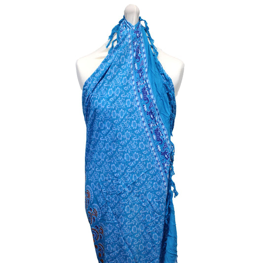 Teal Orange Mandala Sarongs showcase a gorgeous peacock feather design, perfect for stylish beachwear.
