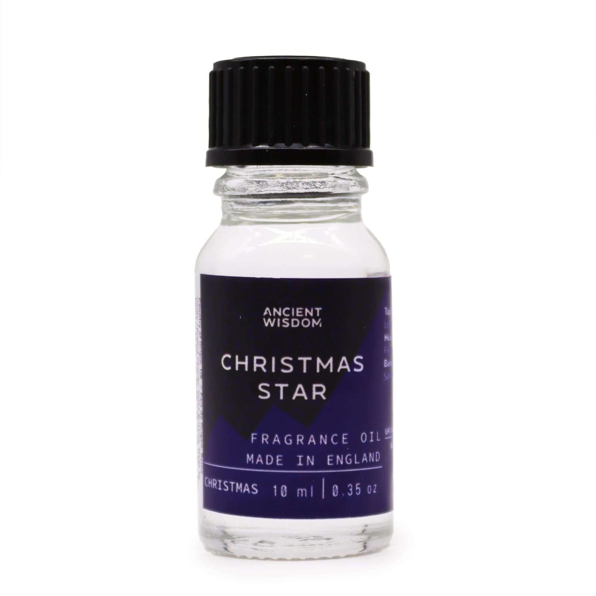 Christmas Star Fragrance Oil 10ml Festive Elegant Holiday Scent in a glass bottle with a black cap.