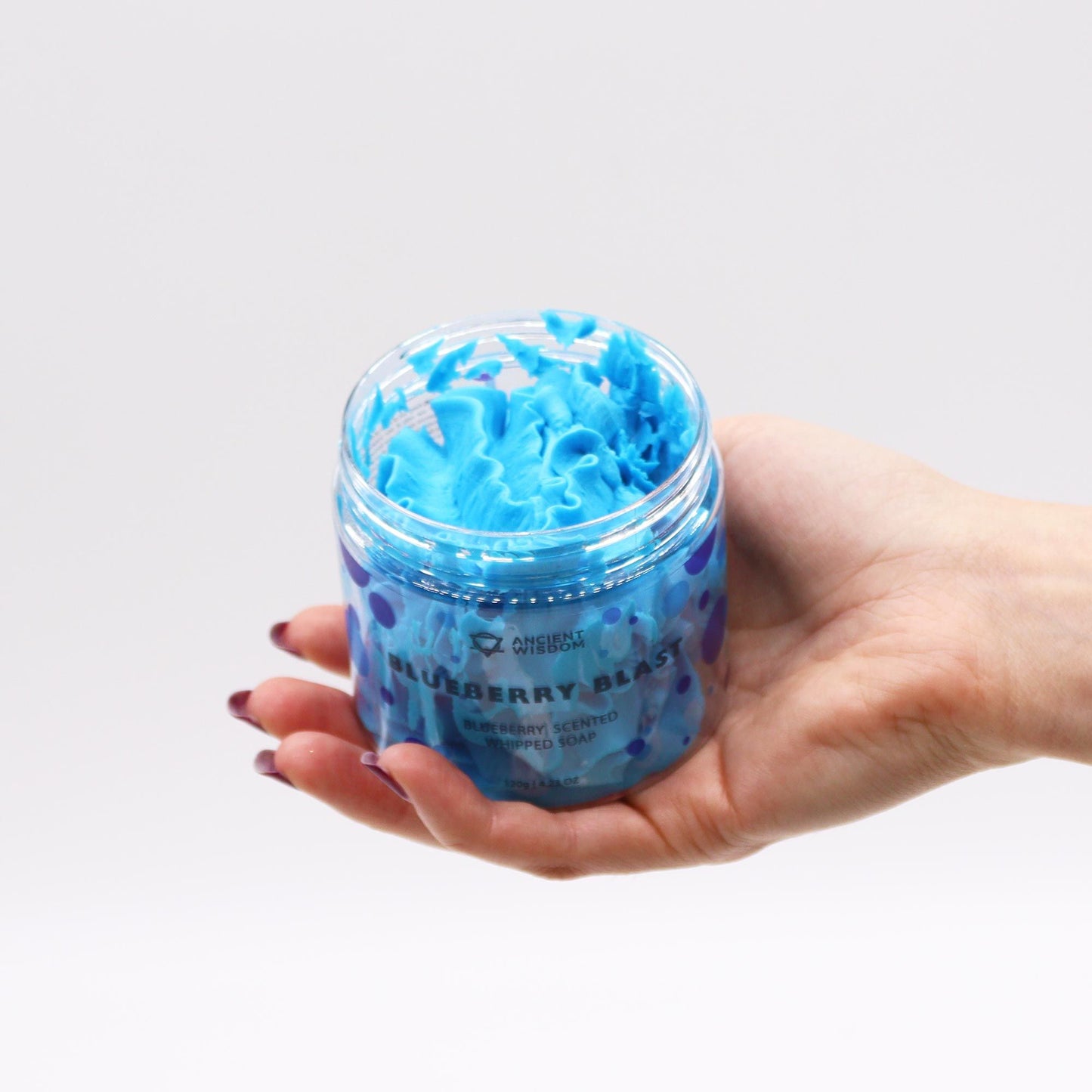 Blueberry Whipped Soap 120g in a jar labelled Blueberry Blast, bright blue whipped soap held in a hand.