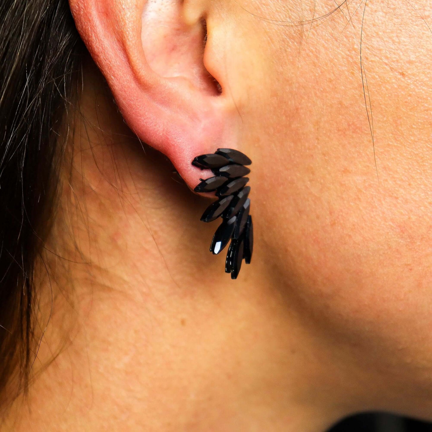 Jet Black Vintage Glass Fairies Earrings Stainless Steel Drops worn on model's ear.