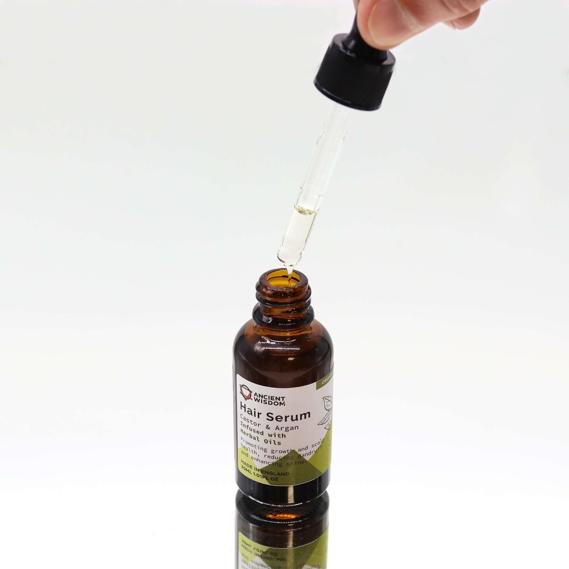 Organic Hair Serum 30ml - Herbal in a brown bottle with dropper, showcasing hair growth and nourishment benefits.
