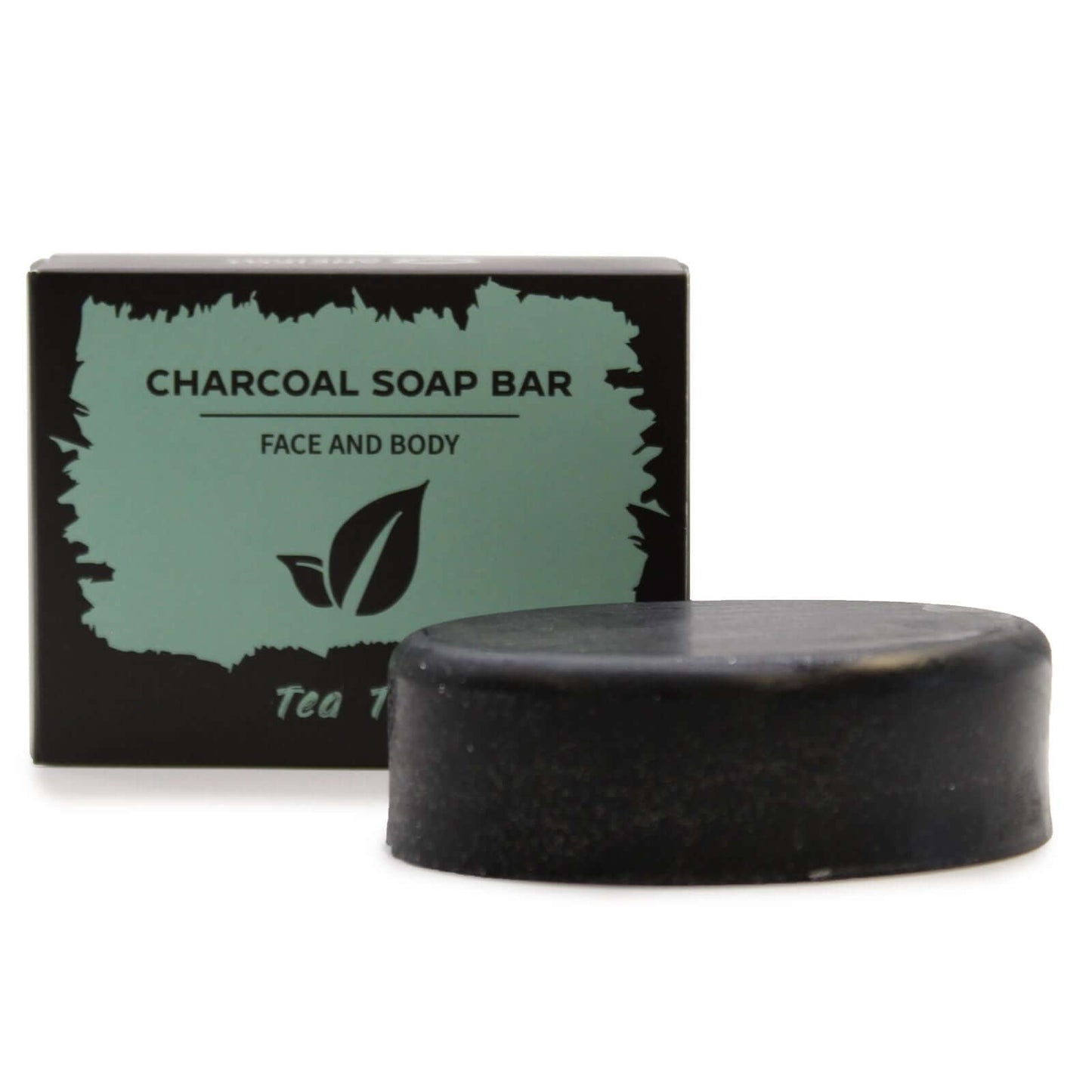 Charcoal Soap 85g - Tea Tree bar and packaging, ideal for deep cleansing and moisturizing skin.