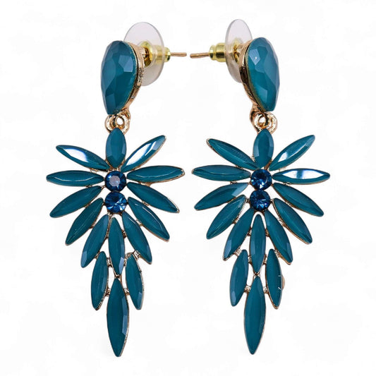 Teal glass long-drop earrings with a floral cluster and blue centre crystals in gold-tone metal.