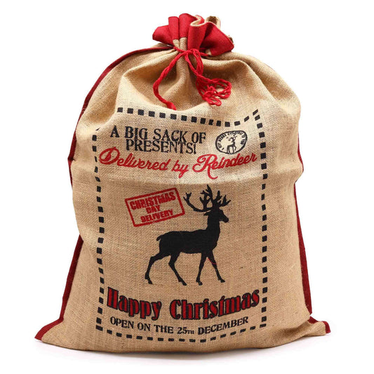 Delivered By Reindeer Jute Sack For Christmas Gifts Reusable with festive reindeer print and red accents.