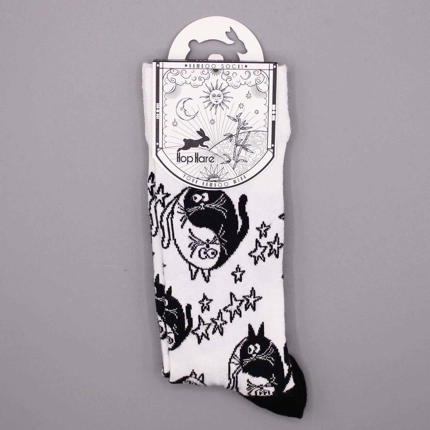 Hop Hare Bamboo Socks M/L - Ying Yang featuring cat designs and star patterns on a white background.