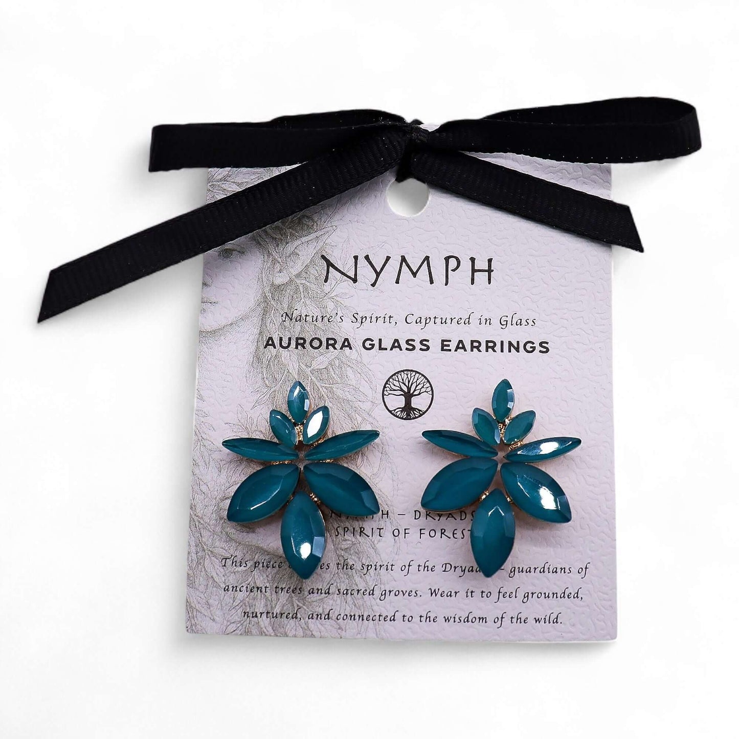 Teal green floral glass earrings on a lilac card with black ribbon, NYMPH Aurora Glass Earrings.