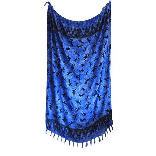 Bali Gecko Sarongs - Blue features a lively gecko pattern on a stunning blue base with elegant fringe trim.