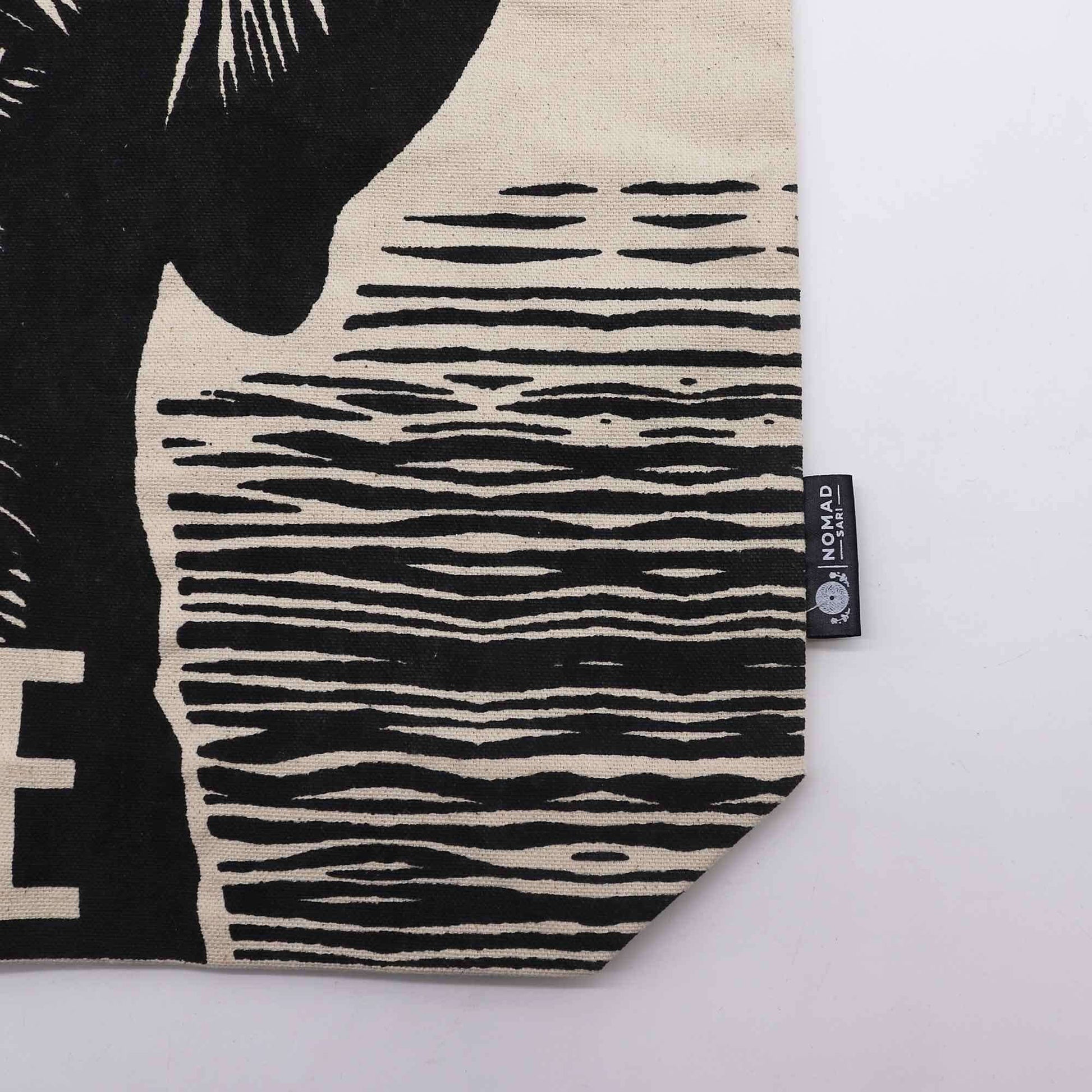 Iconic Classic Tote Bag - It's a Dogs Life - White 10oz design detail showing the fabric texture and tag.