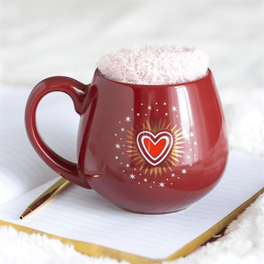 Sacred Heart Mug and Socks Set Deep Red 500ml Cosy Valentine Gift on a notebook.