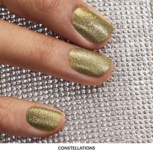Shimmering gold nails showcasing AVON DREAM TO SHINE NAIL ENAMEL - Choose your Shade for a stunning look.