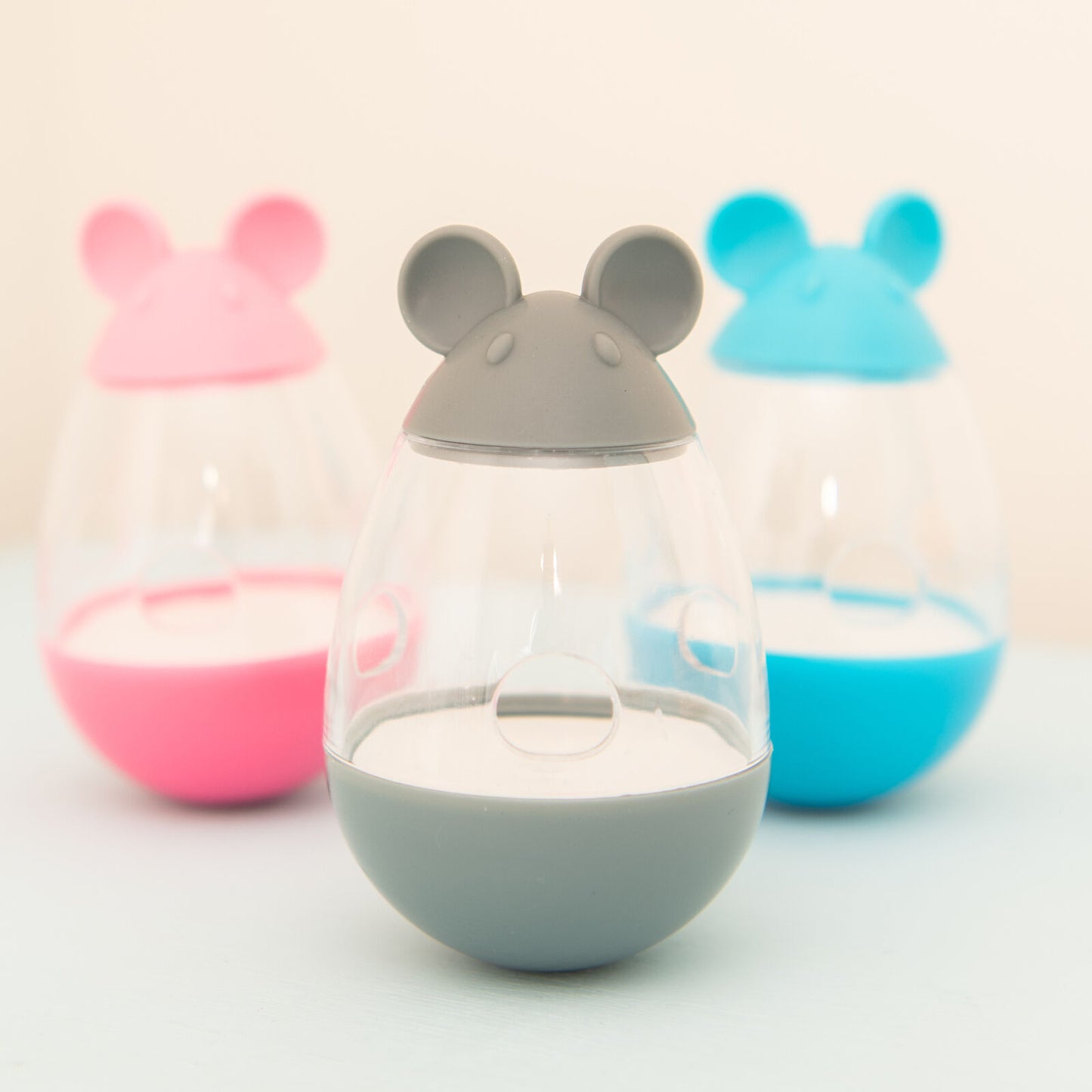 Colourful mouse treat dispensers provide fun for pets, enhancing playtime with rewards from the Meowy Mouser.