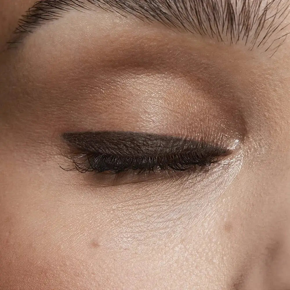 Close-up of an eye featuring Avon True Colour Glimmerstick Eyeliner Cosmic Brown Waterproof Twist Up.