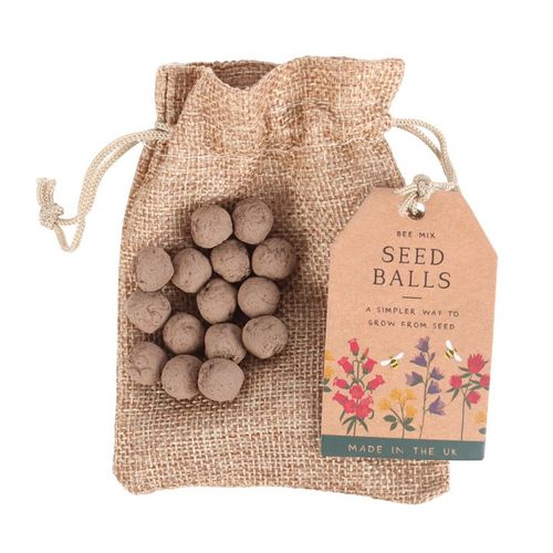 24 Garden Seed Balls in a Bag nestled in a natural pouch, ready to help your garden bloom beautifully.