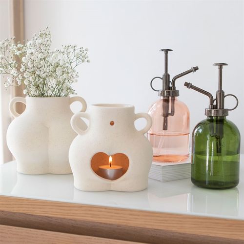 Stylish Pink Minimalist Glass Plant Mister, perfect for indoor gardens and elegant home decor. Ideal gift for plant lovers.
