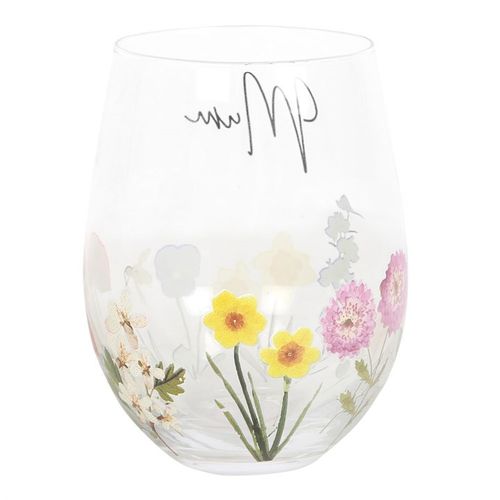 Mum Wildflower Stemless Glass adorned with vibrant floral designs, perfect for enjoying wine in the summer sunshine.